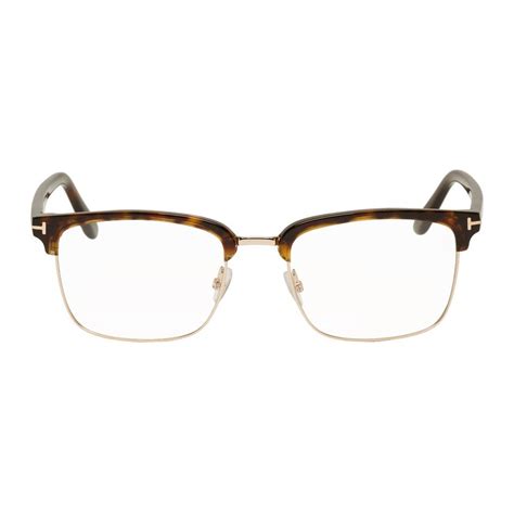 half rim tortoise shell glasses.